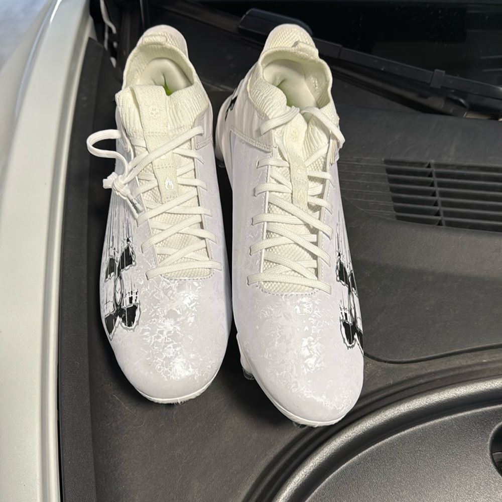 Brand new football grass cleats